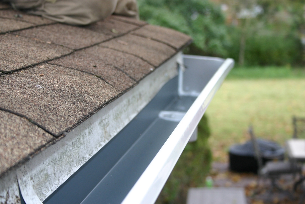 Gutter Painting and Home Protection A,Close-up,Of,A,Clean,,Freshly,Installed,House,Gutter,Along