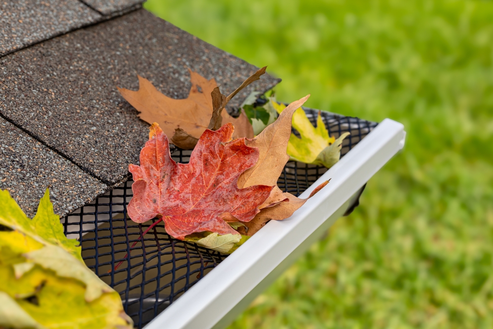 Closeup,Of,House,Rain,Gutter,With,Leaf,Guard,Screen,And